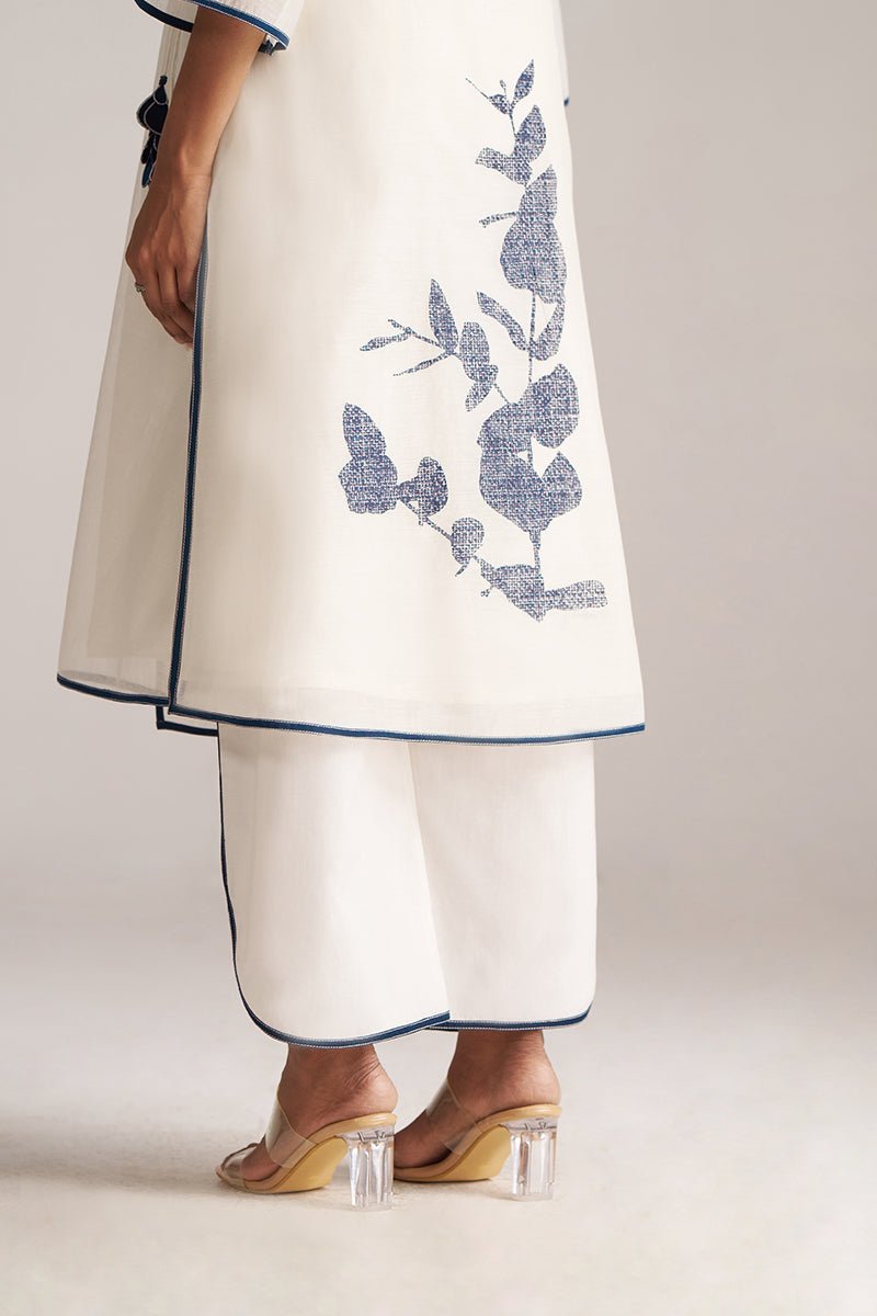 White outfit with blue floral embroidery on a plain background | Ivory and Navy Blue Pure Chanderi Kurta Set