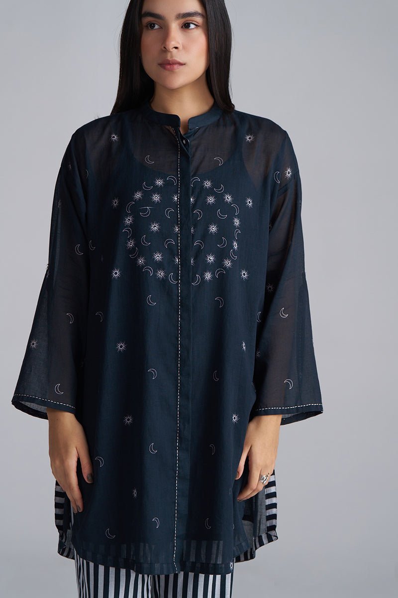 Woman wearing a dark blue embroidered tunic against a gray background | Black & White Mul Mul Co-ord Set for Women | Ganga Fashions