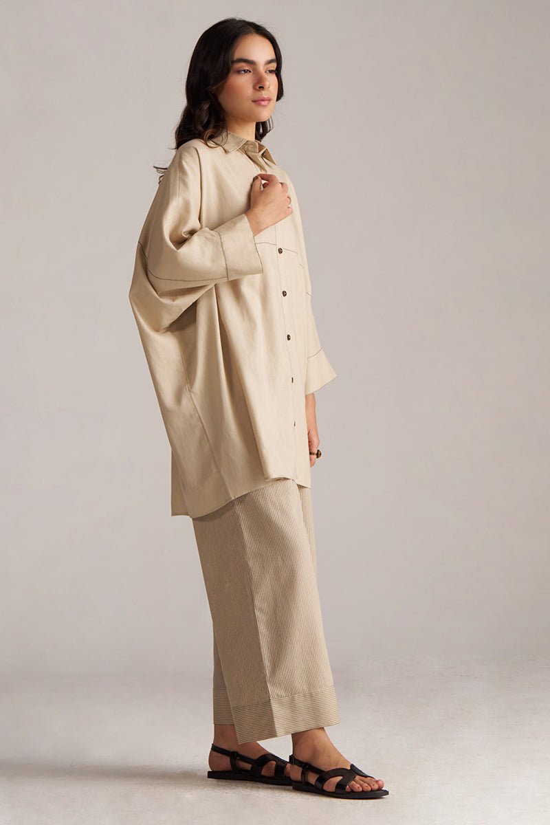 Woman wearing a beige outfit on a plain background | Brown Rice Co-ord Set for Women | Rangmanch | Ganga Fashions