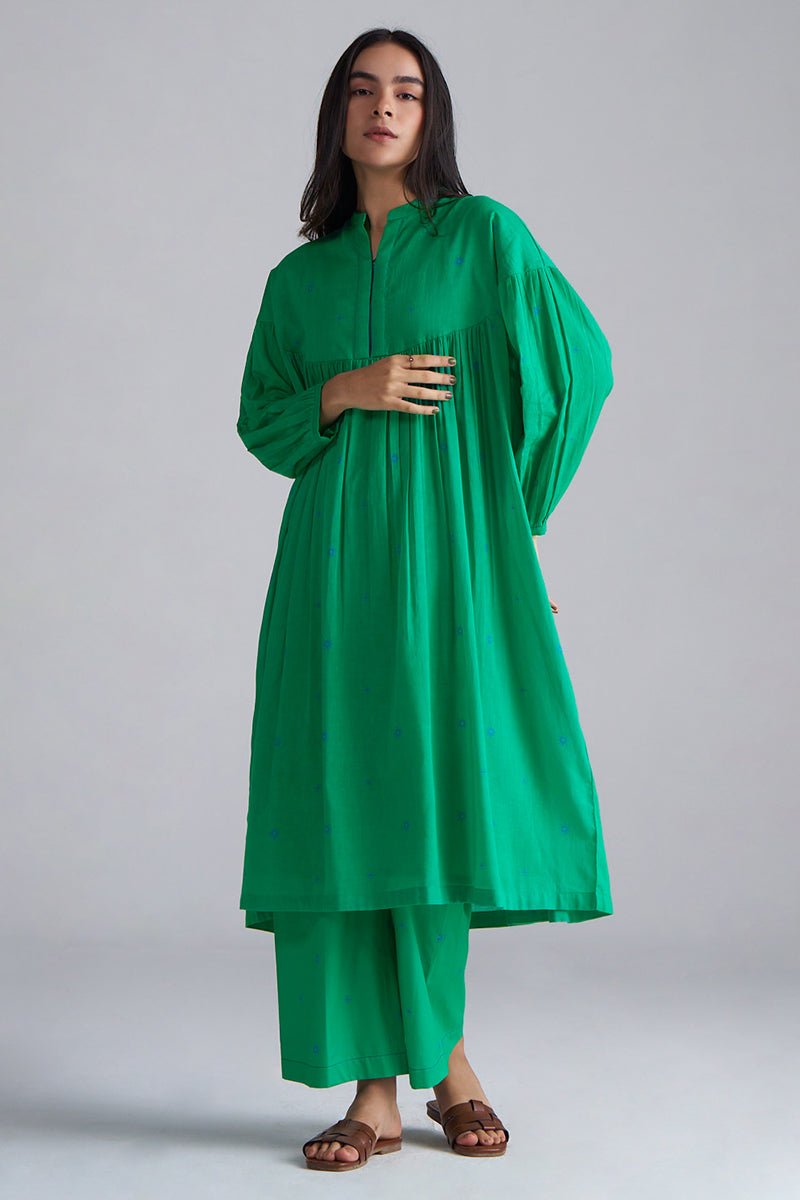 Woman wearing a green outfit against a gray background, Holly Green Mul Mul Co-ord Set for Women | Ganga Fashions