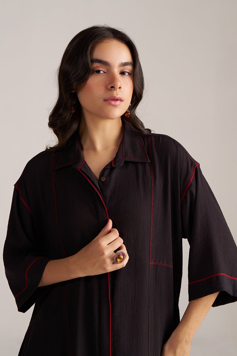 Woman wearing a black shirt with red accents against a plain background, Black Co-ord Set for Women | Rangmanch Collection | Ganga Fashions