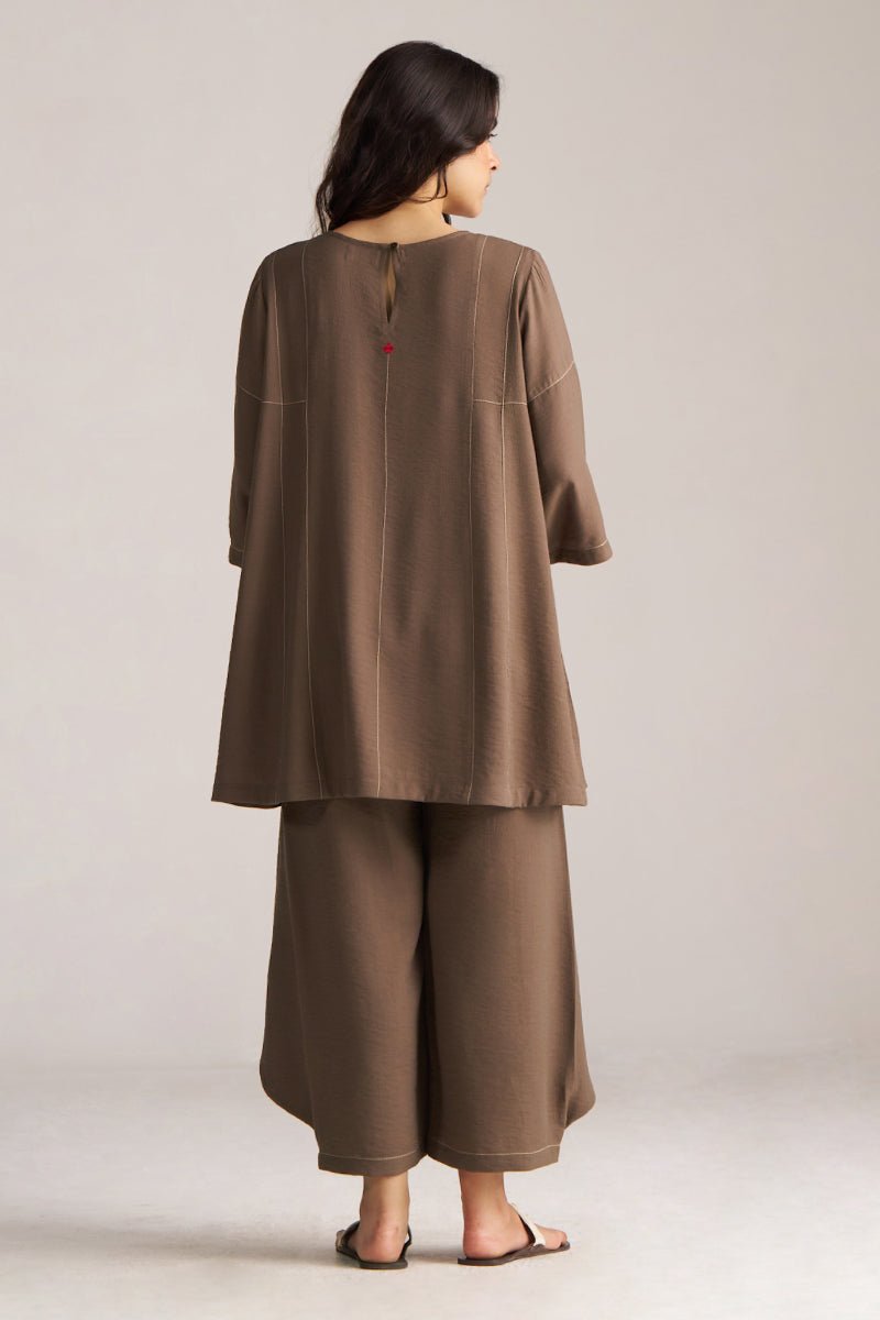 Woman wearing a brown outfit with wide-leg pants on a plain background, Rain Drum Brown Co-ord Set for Women | Rangmanch | Ganga Fashions