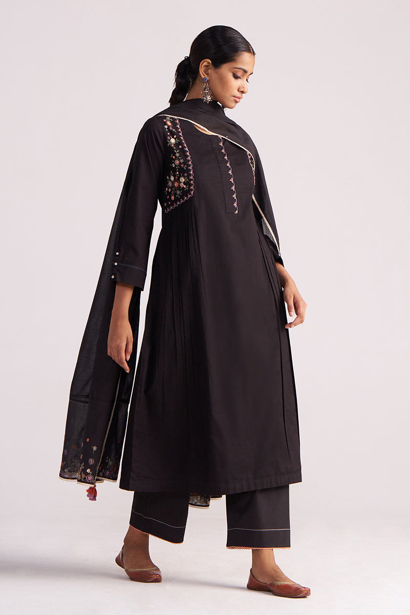 Woman wearing a Black Embroidered Kurta Set on a white background