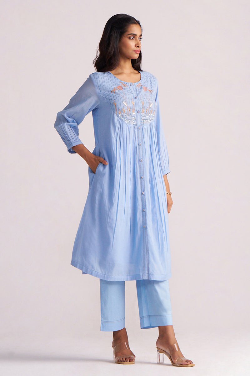 Woman wearing a Airy Blue Mul-Chanderi Co-ord Set on a white background