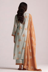 Woman wearing a Grey-Rust Mul Kurta Set on a plain background