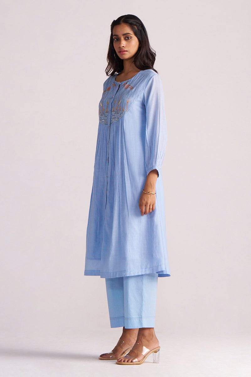 Woman wearing a Airy Blue Mul-Chanderi Co-ord Set on a white background