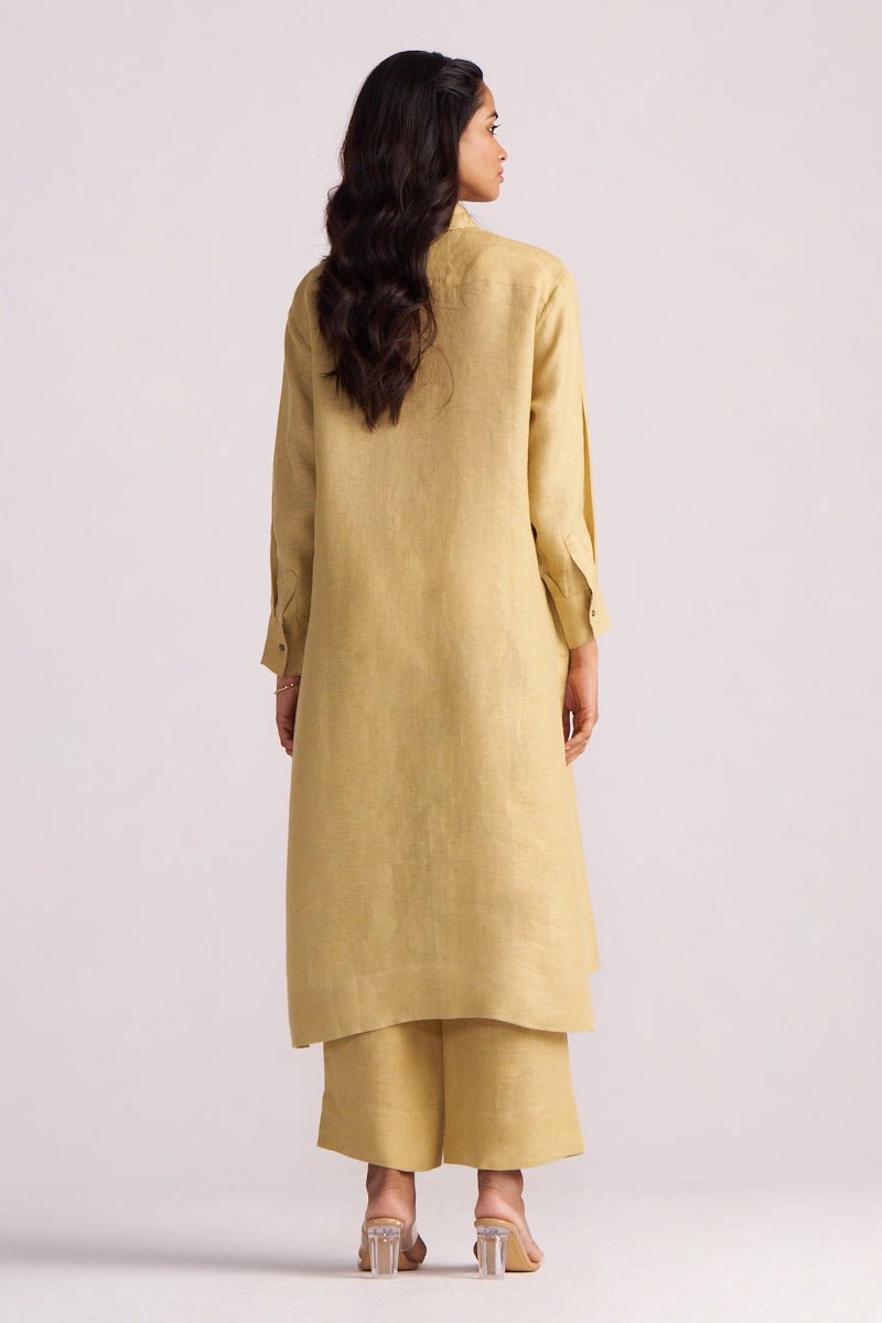 Woman wearing a Fall Leaf Pure Linen Co-ord Set on a light gray background
