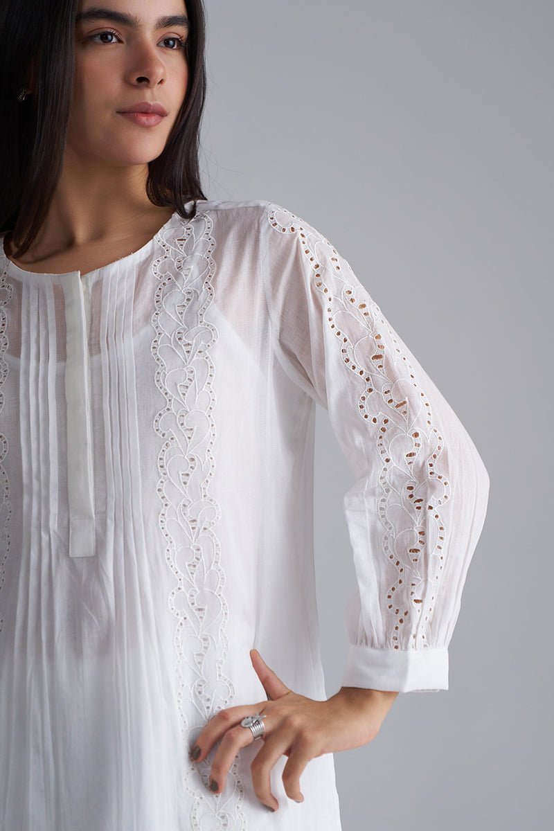 Woman wearing a white blouse with lace details on a gray background, White Mul Mul Co-ord Set for Women | Rangmanch | Ganga Fashions