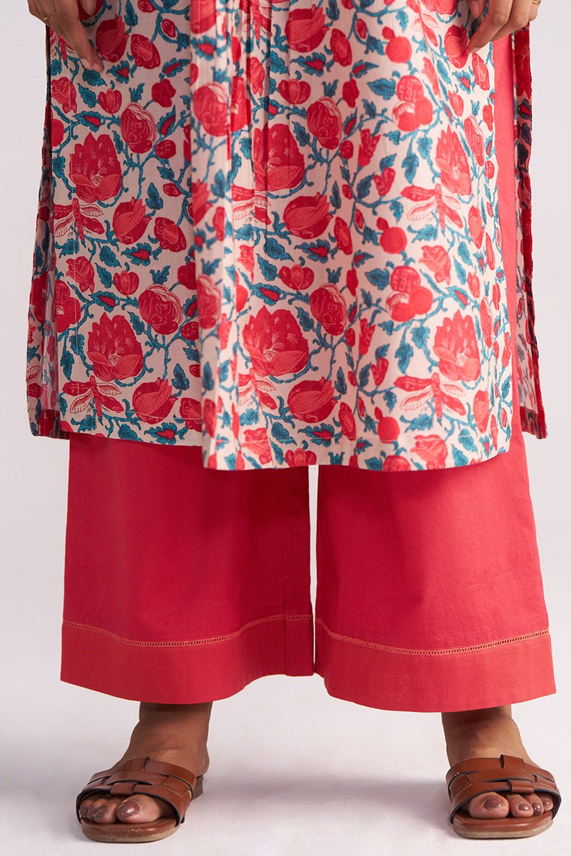 Person wearing a Beige and Red Cotton Print Co-ord Set on a white background