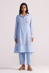 Woman wearing a Soft Sky Blue Mul-Mul Co-ord Set on a white background