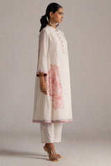 Woman wearing a white kurta with pink floral details on a plain background | Buy Ivory and Maroon Pure Chanderi Kurta Set - Ganga Fashions