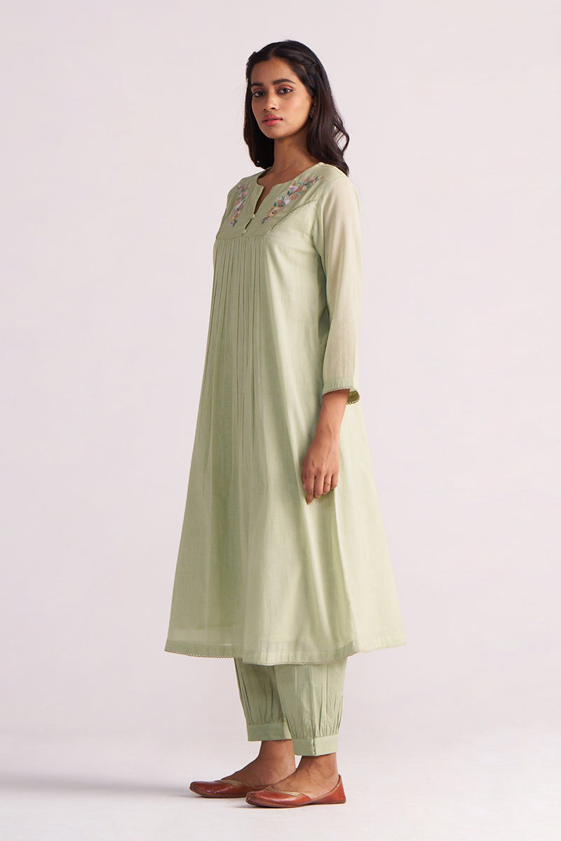 Woman wearing a Quient Green Mul-Mul Co-ord Set on a white background