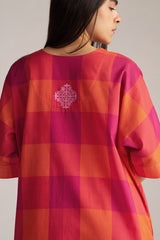 Person wearing a red and orange checkered shirt with a small emblem on a plain background | Tomato and Fuchsia Mul Mul Co Ord Set