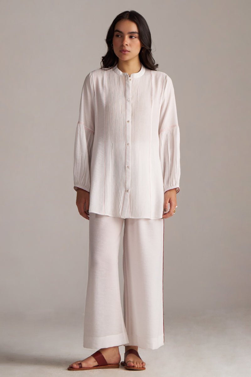 Woman wearing a white striped shirt and wide-leg pants on a plain background | Pure White Co-ord Set for Women | Rangmanch | Ganga Fashions