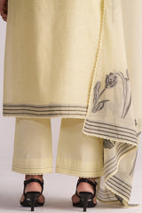 Butter Yellow Chanderi Woven Kurta Set with black floral embroidery on a white background