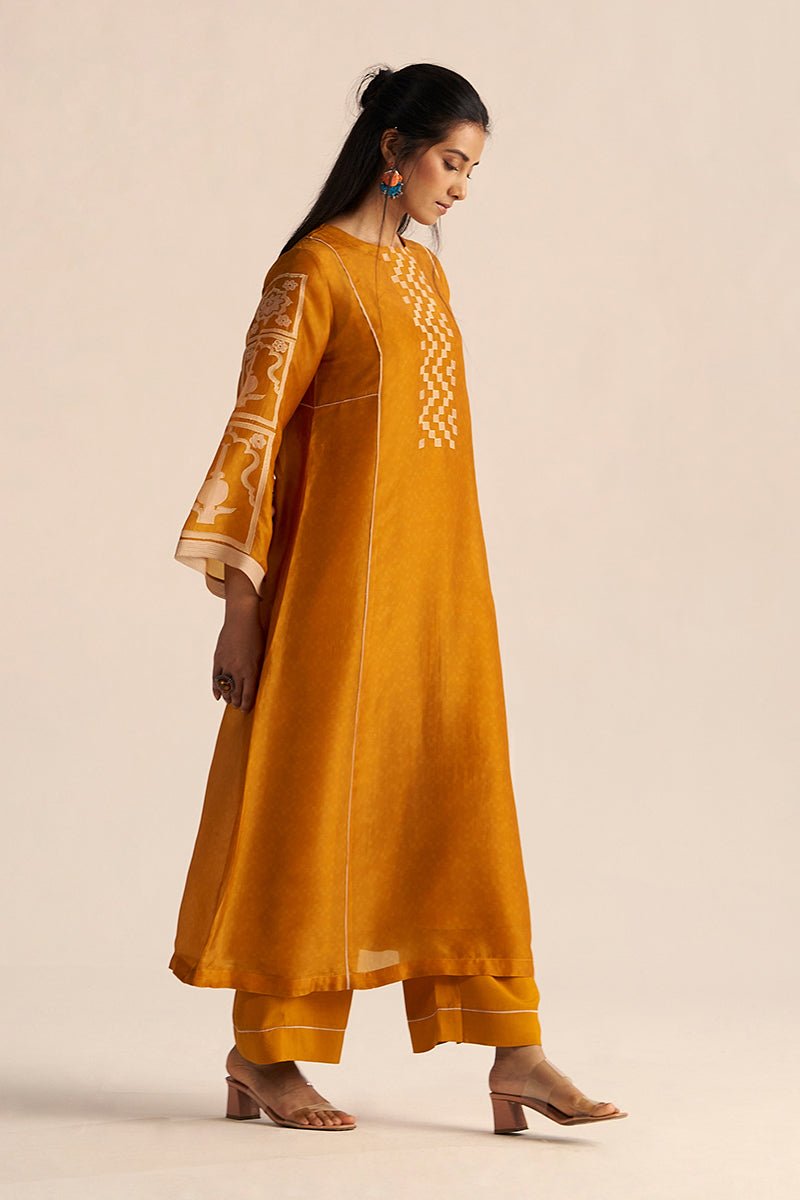 right side model view nugget yellow silk co ord set
