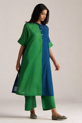 Woman wearing a green and blue kurta with pants on a plain background | Blue and Green Mul Mul Co Ord Set