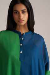 Woman wearing a blue and green color-blocked shirt against a plain background | Blue and Green Mul Mul Co Ord Set