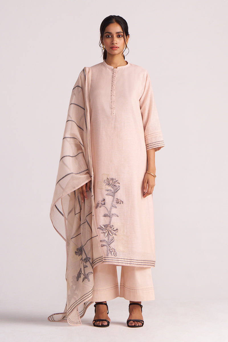 Woman wearing a Sepia Rose Woven Chanderi Kurta Set and a matching dupatta on a white background