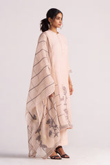 Woman wearing a Sepia Rose Woven Chanderi Kurta Set with a floral pattern on a white background