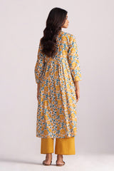 Woman wearing a Beige and Mustard Cotton Print Co-ord Set background