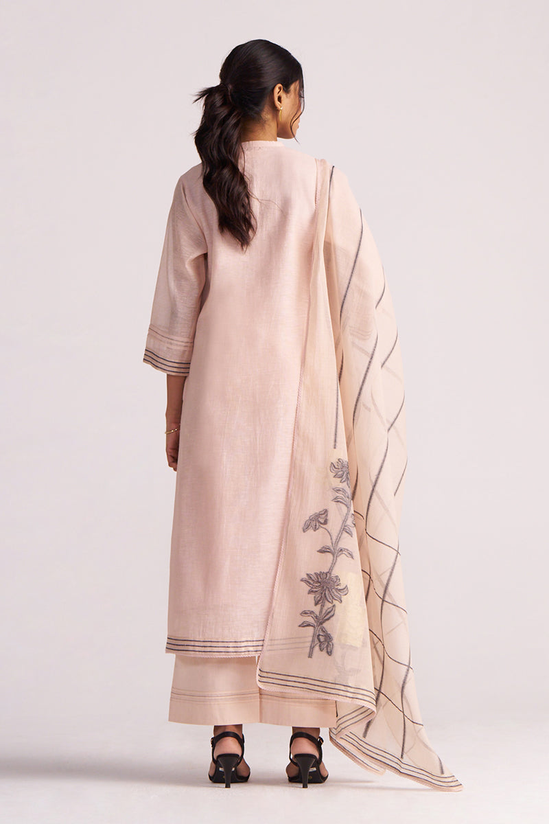 Woman wearing a Sepia Rose Woven Chanderi Kurta Set with a matching dupatta on a white background