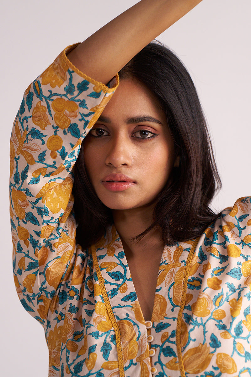 Woman wearing a Beige and Mustard Cotton Print Co-ord Set.