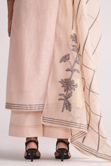 Sepia Rose Woven Chanderi Kurta Set with floral embroidery draped over a white background