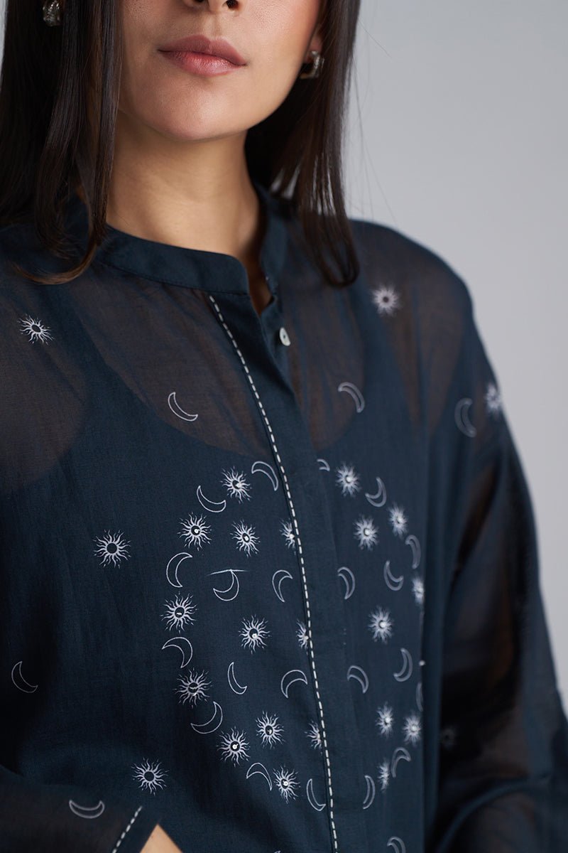 Navy blue shirt with celestial pattern worn by a person on a plain background | Black & White Mul Mul Co-ord Set for Women | Ganga Fashions