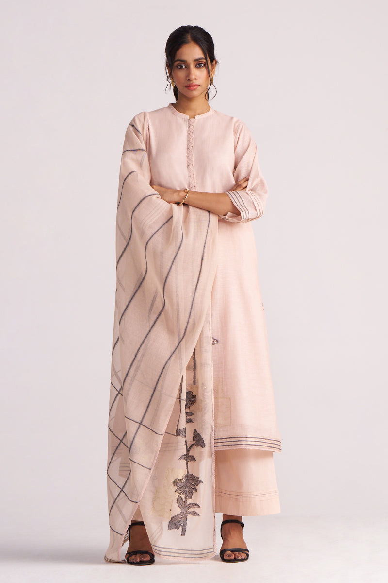 Woman wearing a Sepia Rose Woven Chanderi Kurta Set with a subtle pattern on a white background