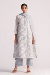 Woman wearing a Grey Woven Pheran Kurta Set on a white background