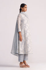 Woman wearing a Grey Woven Pheran Kurta Set on a white background