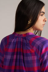 Person wearing a purple and red checkered shirt against a plain background, Purple Checkard Mul Mul Co Ord Set