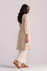 Woman wearing a Cream and Pink Tiny Floral Hand-Print Co-ord Set on a plain background