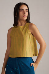 Woman wearing a yellow pleated top and blue pants against a neutral background | Navigate Blue Checkard Kimono with Moss Yellow Top and Blue Bottom Co Ord Set