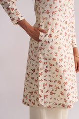 Cream and Pink Tiny Floral Hand-Print Co-ord Set worn by a person on a plain background