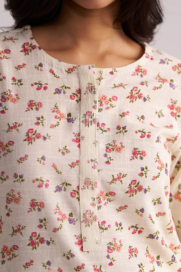 Close-up of a Cream and Pink Tiny Floral Hand-Print Co-ord Set.