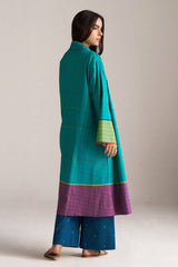 Woman wearing a teal and purple traditional outfit on a plain background | Navigate Blue Checkard Kimono with Moss Yellow Top and Blue Bottom Co Ord Set