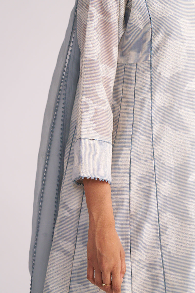 Person wearing a Grey Woven Pheran Kurta Set on a plain background