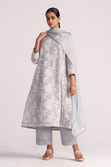 Woman wearing a Grey Woven Pheran Kurta Set outfit with a matching dupatta on a white background