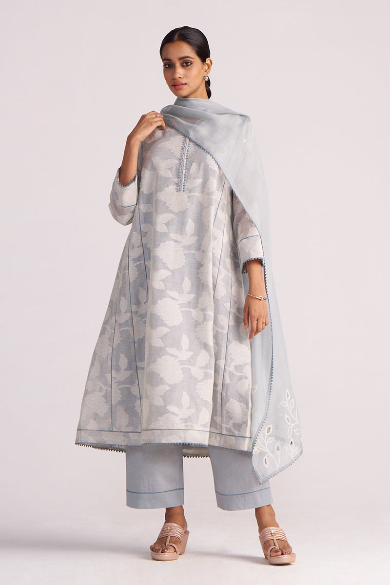 Woman wearing a Grey Woven Pheran Kurta Set outfit with a matching dupatta on a white background