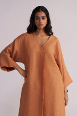 Woman wearing a Sunburn Pure Linen Co-ord Set a plain background