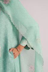 Light green fabric with Dusty Jade Green Woven Silk Kurta Set on a plain background