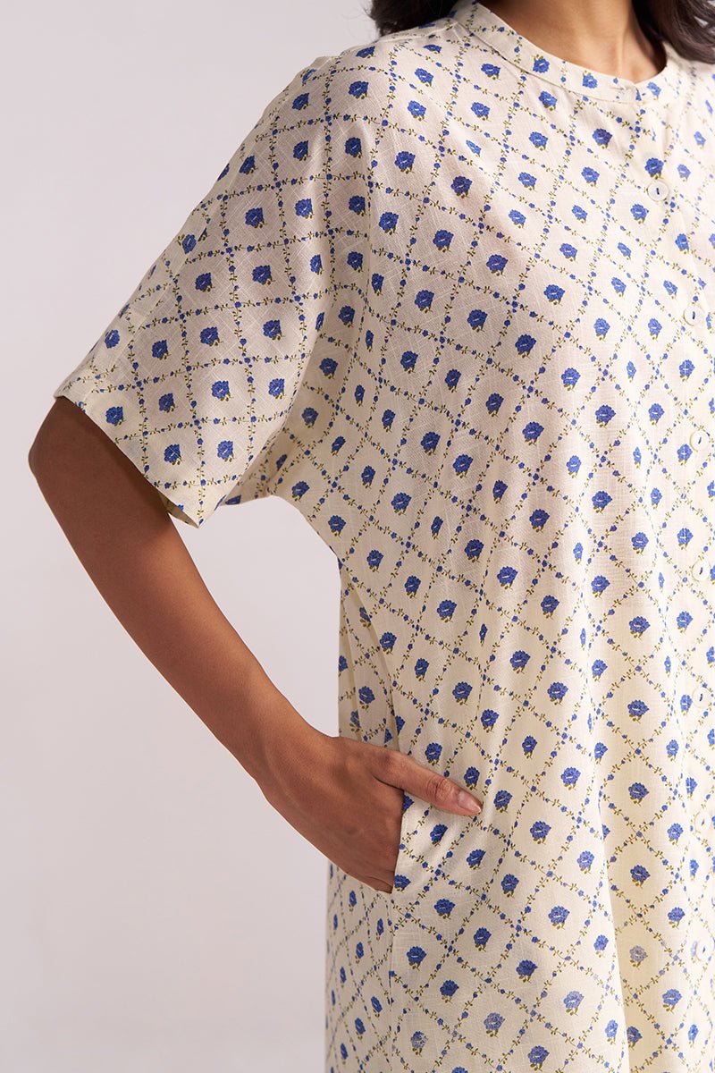 Person wearing a Cream and Blue Small Flower Hand-Print Cotton Linen Co-ord Set on a plain background