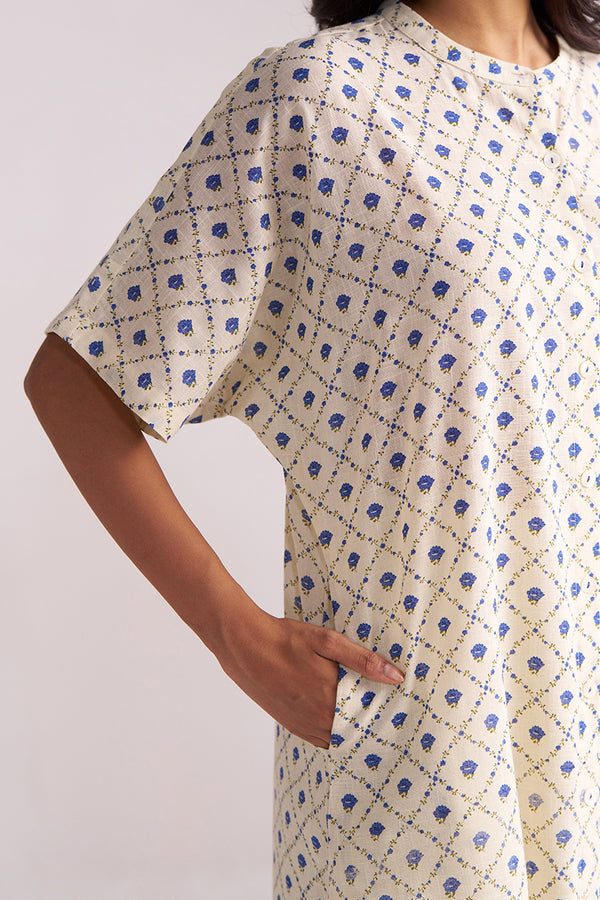 Person wearing a Cream and Blue Small Flower Hand-Print Cotton Linen Co-ord Set on a plain background