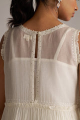 Close-up of a white lace dress with a neutral background | Ivory Kota Silk Kurta Set for Women