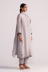 Woman wearing a Grey Woven Kurta Set with floral patterns on a white background