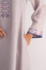 Grey Woven Kurta Set with floral embroidery on a plain background