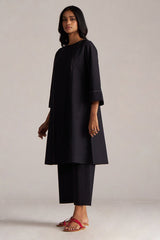 Woman wearing a black outfit against a plain background | Black Co-ord Set – Ethnic Wear for Women | Ganga Fashions