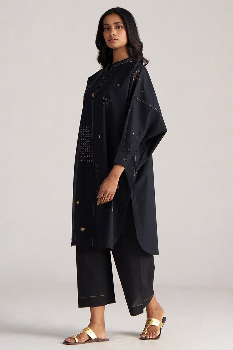 Woman wearing a black outfit with gold sandals on a plain background, Black Cotton Co-ord Set for Women | Rangmanch | Ganga Fashions